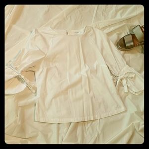 Frame white top with bell cuff sleeves
